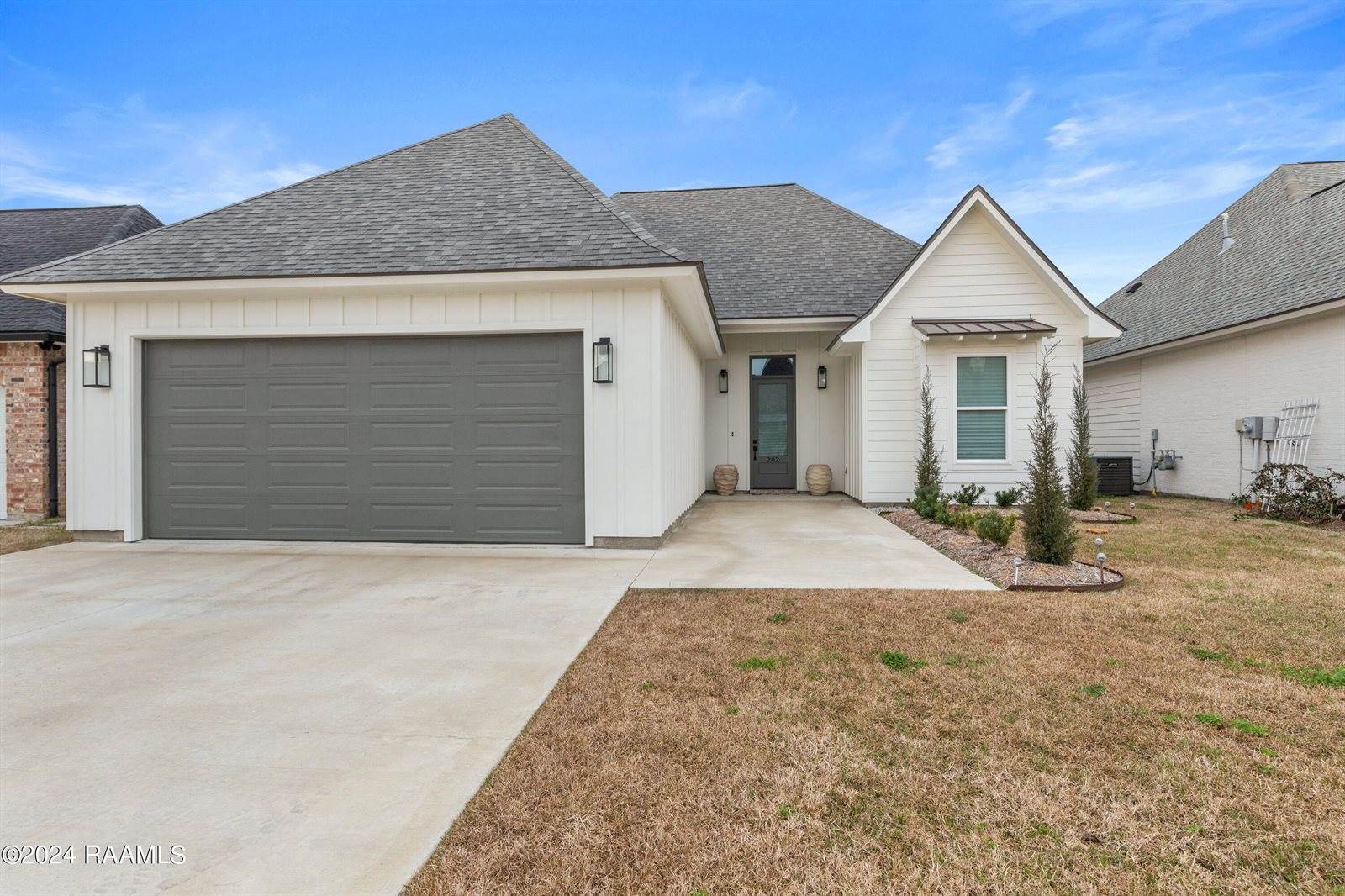 202 Golden Cypress Drive, Youngsville, LA 70592