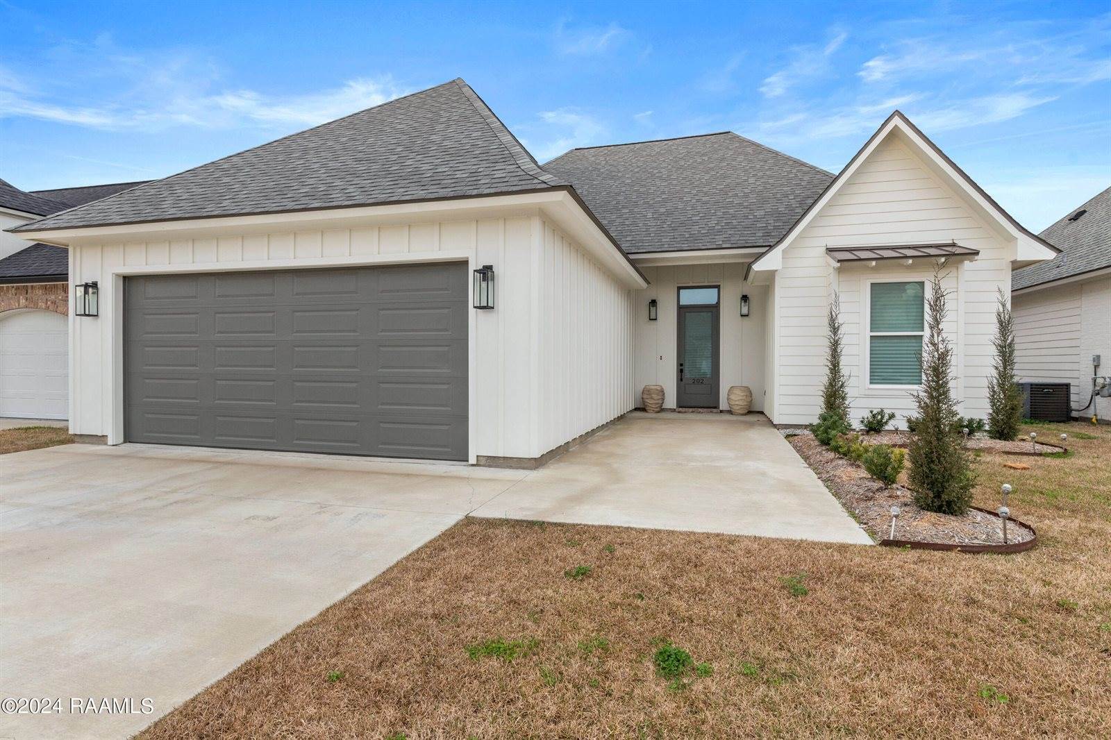 202 Golden Cypress Drive, Youngsville, LA 70592