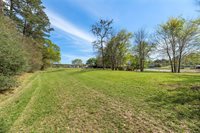 2 Wildwood Lake Drive, Huntsville, TX 77340