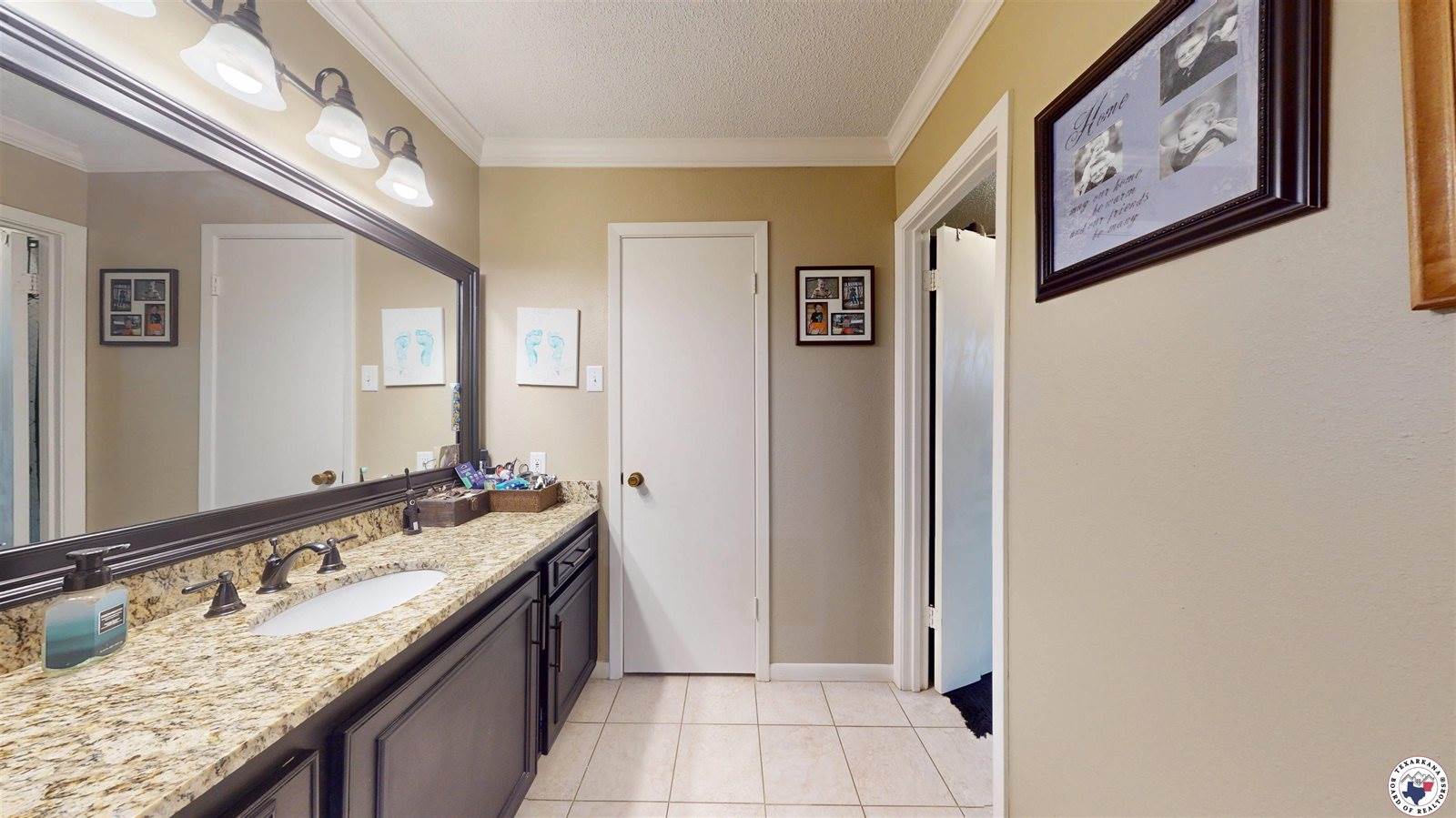 203 Woodland Lake Dr, Atlanta, TX 75551