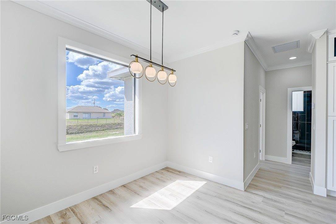 1019 Cedartree Avenue, Lehigh Acres, FL 33971