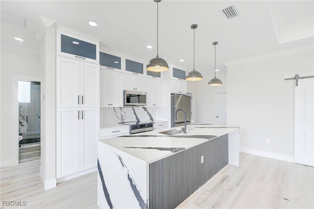 1019 Cedartree Avenue, Lehigh Acres, FL 33971