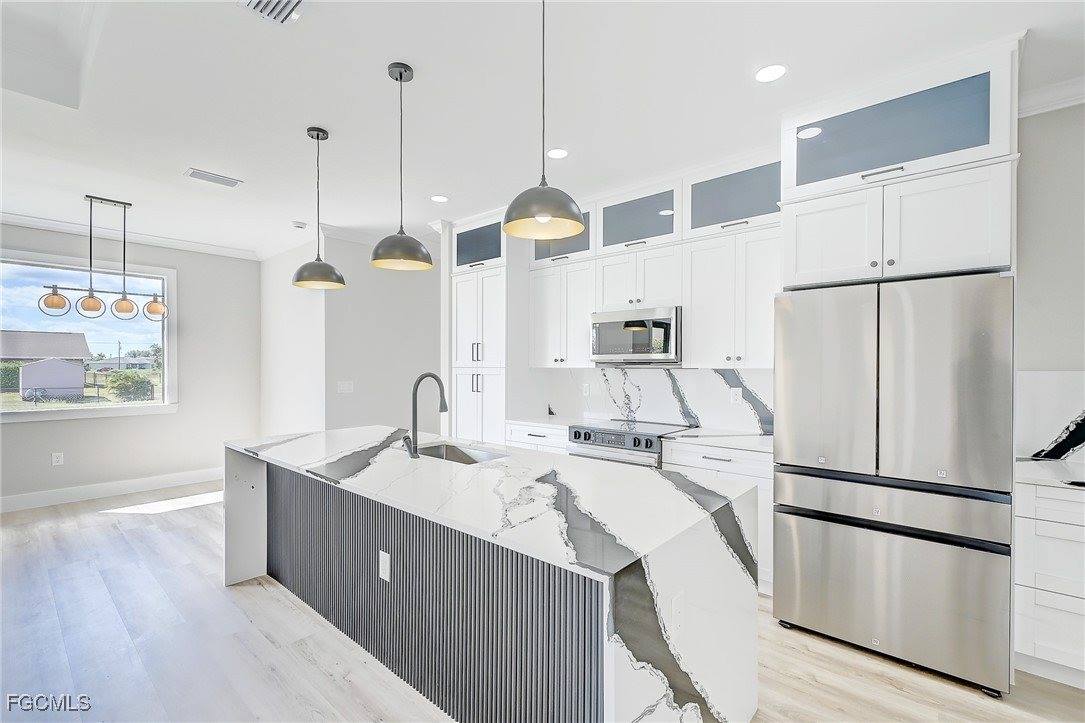 1019 Cedartree Avenue, Lehigh Acres, FL 33971