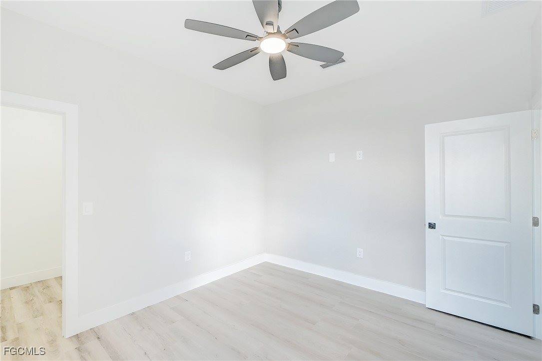 1019 Cedartree Avenue, Lehigh Acres, FL 33971