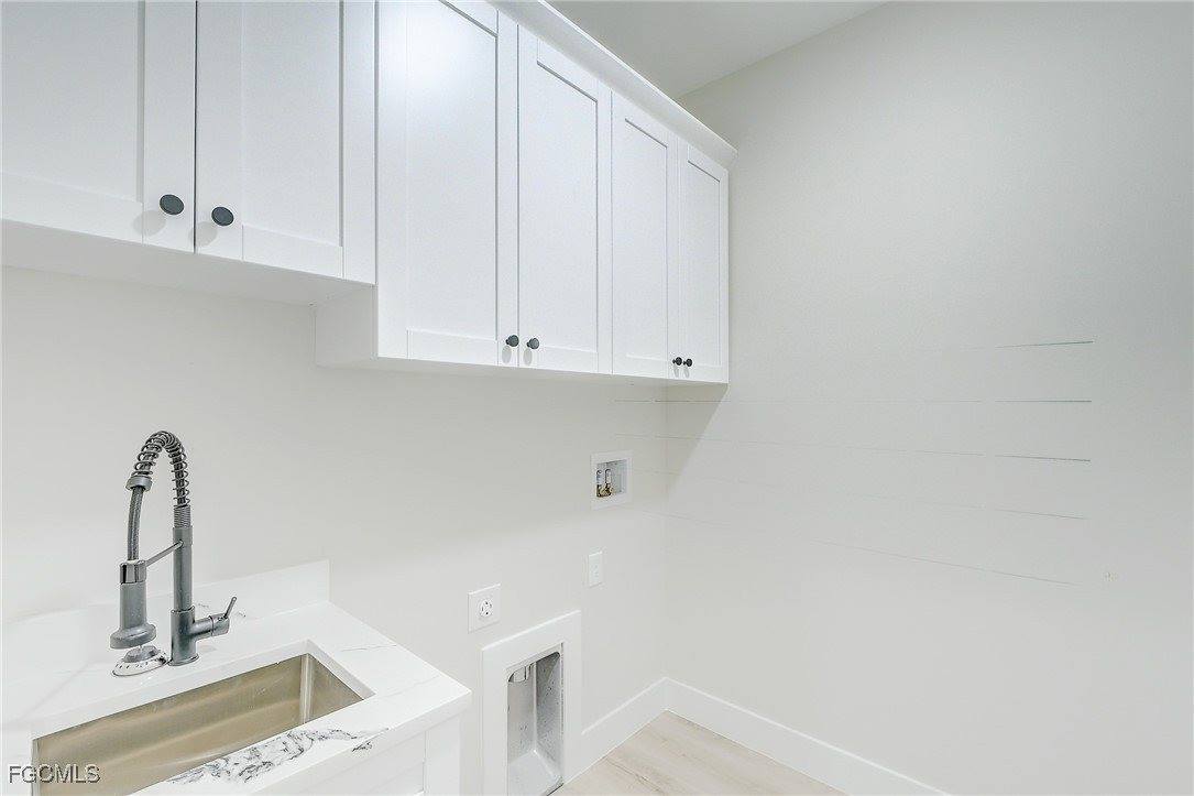 1019 Cedartree Avenue, Lehigh Acres, FL 33971