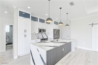 1019 Cedartree Avenue, Lehigh Acres, FL 33971