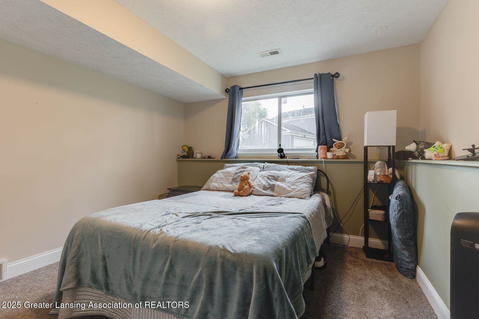 129 Village Drive, LansingCity_Ingham, MI 48911