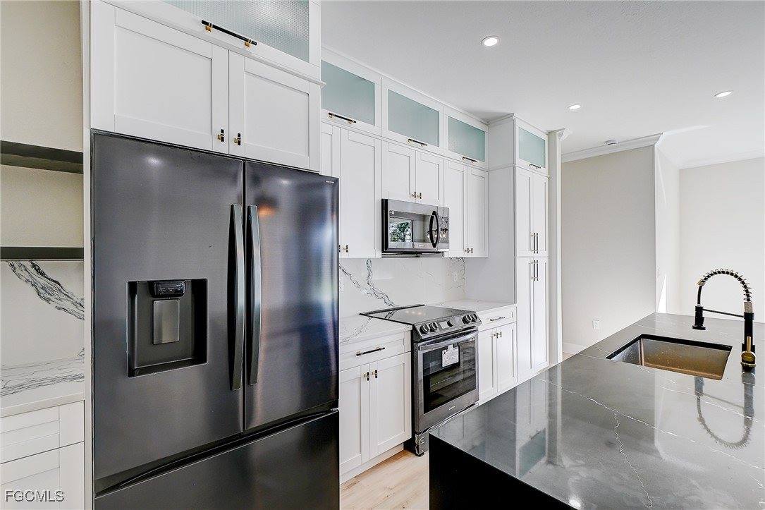 656 Crabtree Court, Lehigh Acres, FL 33974