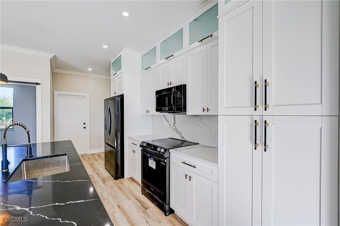 656 Crabtree Court, Lehigh Acres, FL 33974