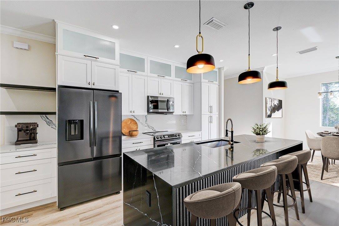 656 Crabtree Court, Lehigh Acres, FL 33974