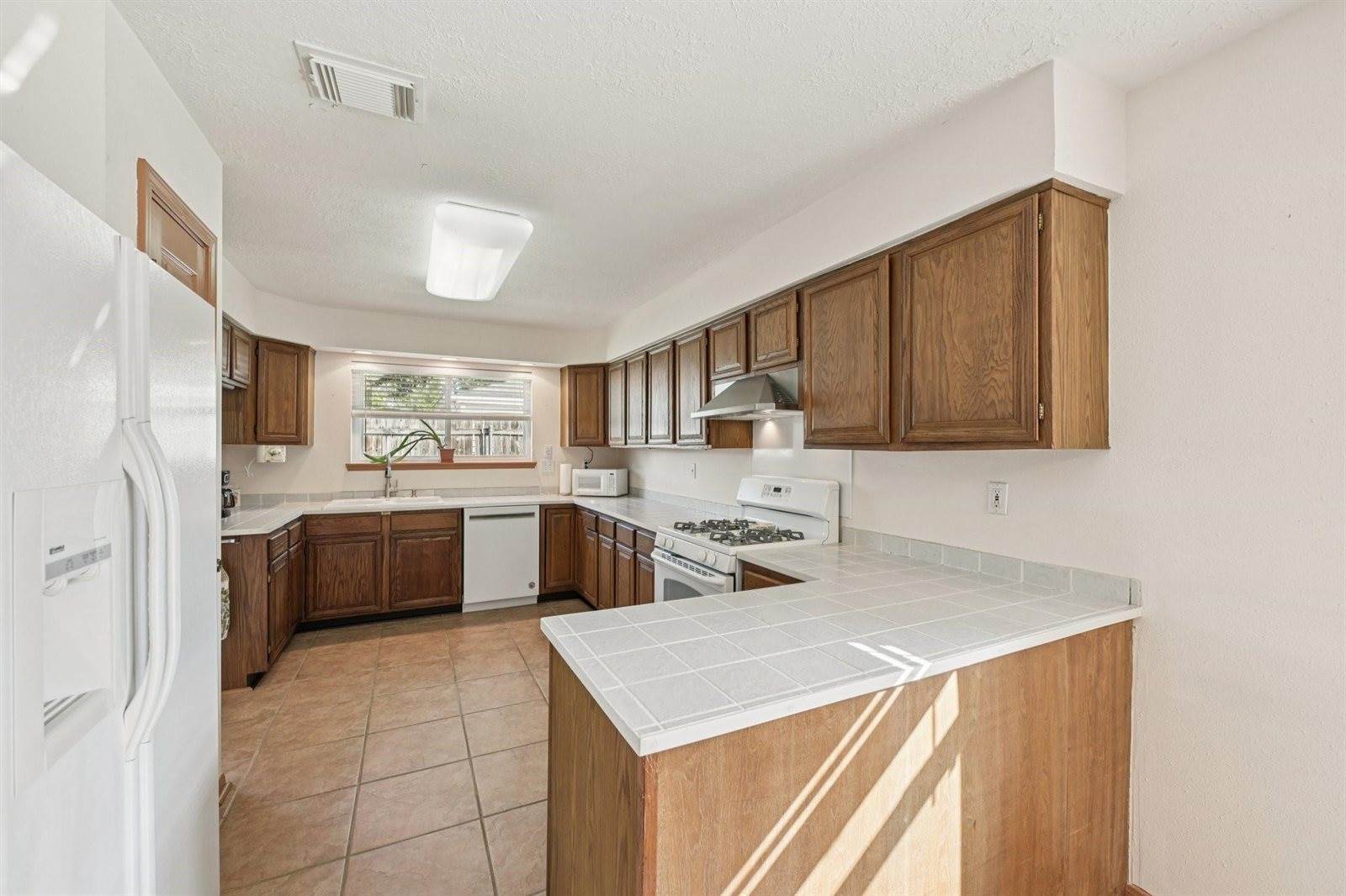 10003 Cane Creek Drive, Houston, TX 77070