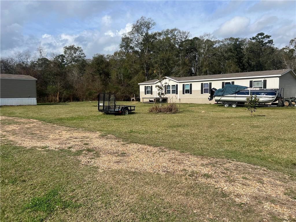 16221,16227,16229 East Club Deluxe Road, Hammond, LA 70403