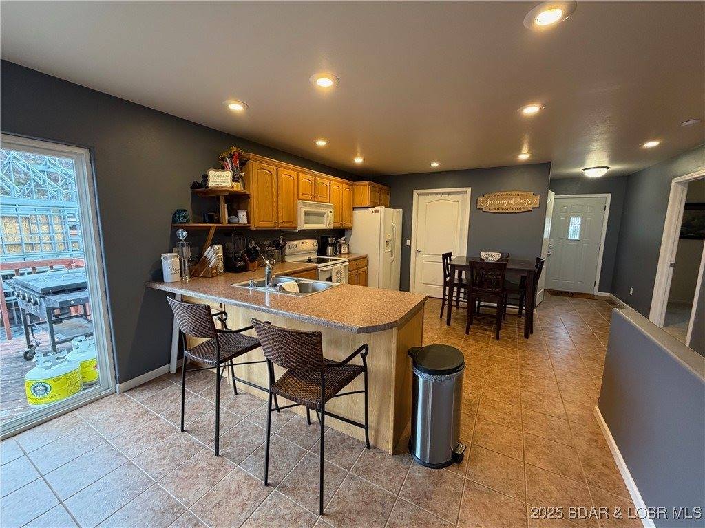 27630 Golden Point Lane, Barnett, MO 65011