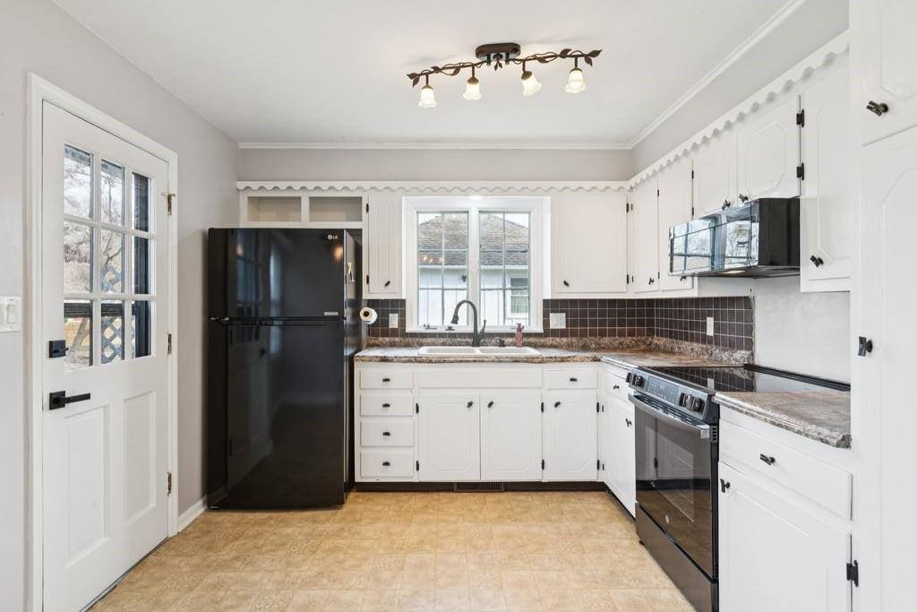 506 South Adams Street, Raymore, MO 64083