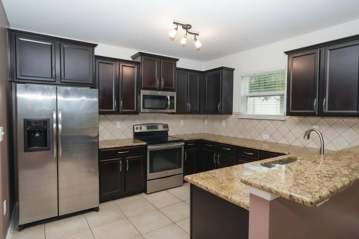 5909 Windsong Oak Drive, Leesburg, FL 34748