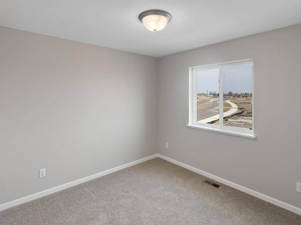 7782 Bunker Lake Boulevard NW, Ramsey, MN 55303