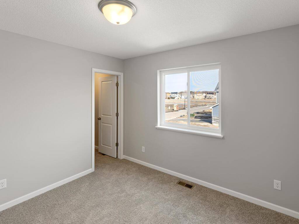 7782 Bunker Lake Boulevard NW, Ramsey, MN 55303