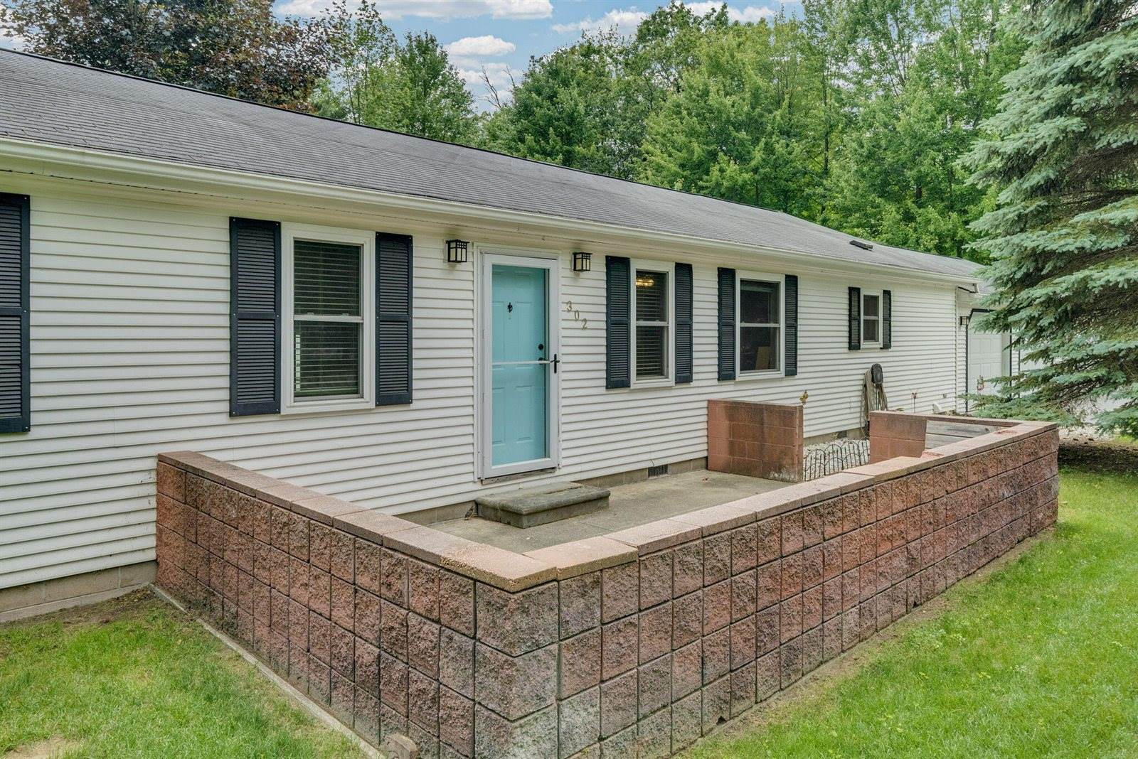 302 Redwine Drive, Houghton Lake, MI 48629