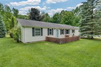 302 Redwine Drive, Houghton Lake, MI 48629