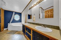 302 Redwine Drive, Houghton Lake, MI 48629