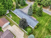 302 Redwine Drive, Houghton Lake, MI 48629