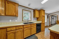 302 Redwine Drive, Houghton Lake, MI 48629
